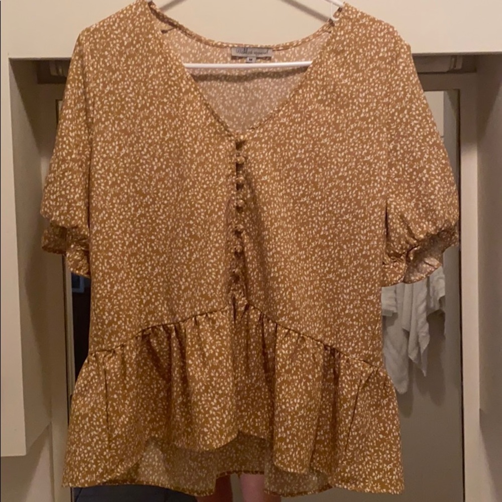 Mustard yellow shirt with white print